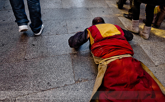 Prostrating Tibetan Monk